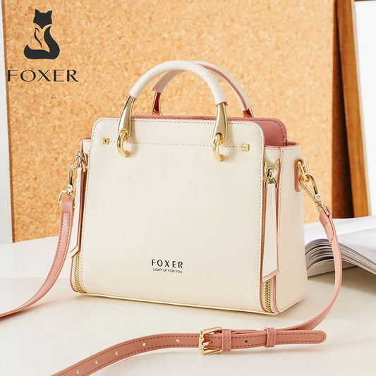 Elegant FOXER split leather shoulder bag for women with large capacity, soft material, multiple compartments, and versatile tote style in cream and blush pink.