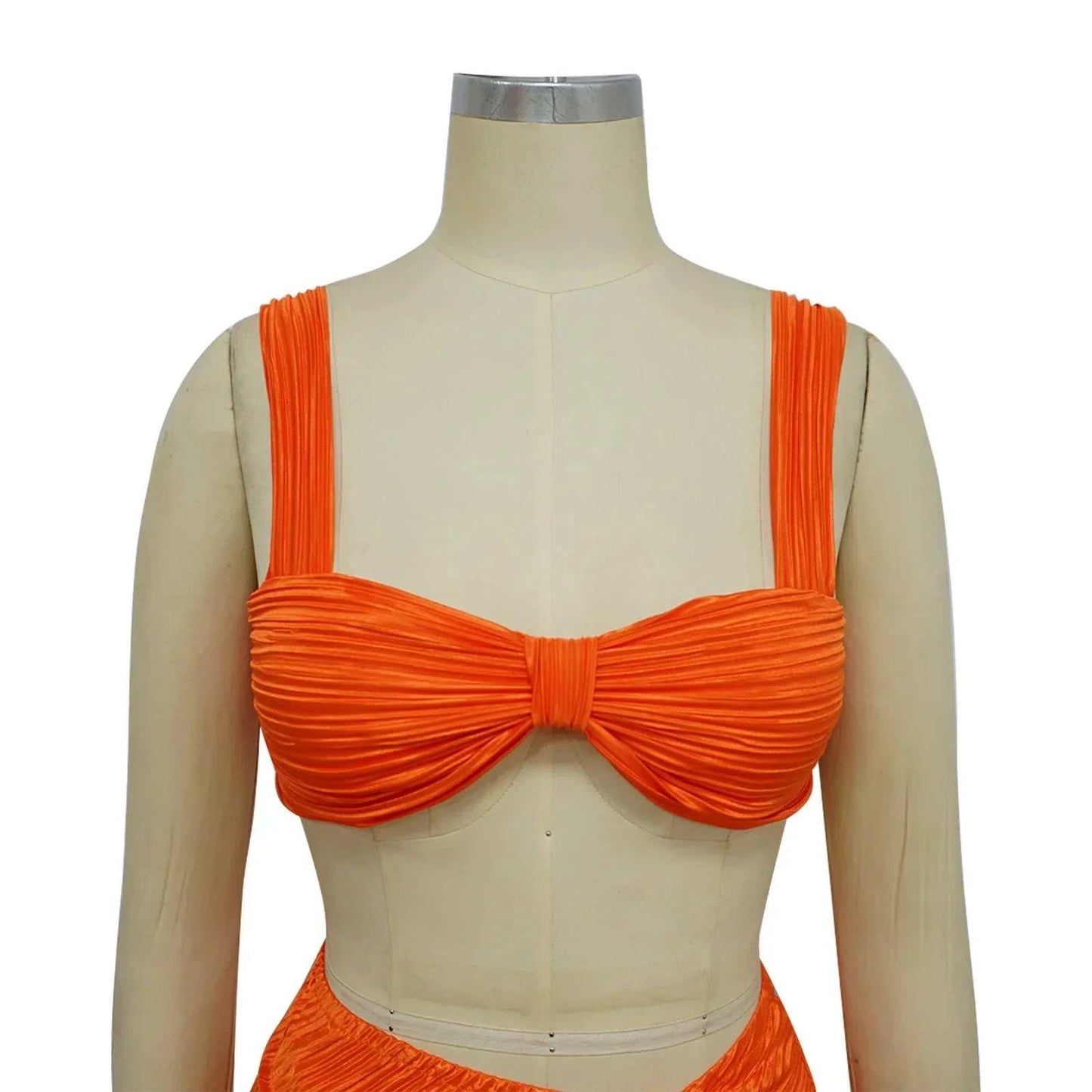 Orange backless halter top and high waist side slit pleated skirt set for women, perfect for spring and summer streetwear.
