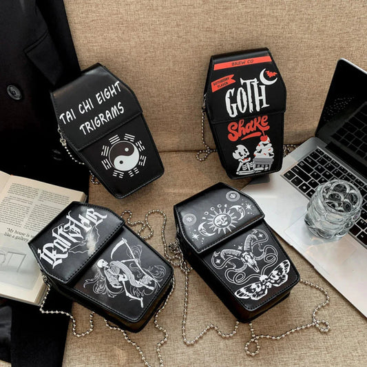Women gothic crossbody bag set in coffin shape with PU leather, zipper closure, and printed cartoon designs on metal chain straps.