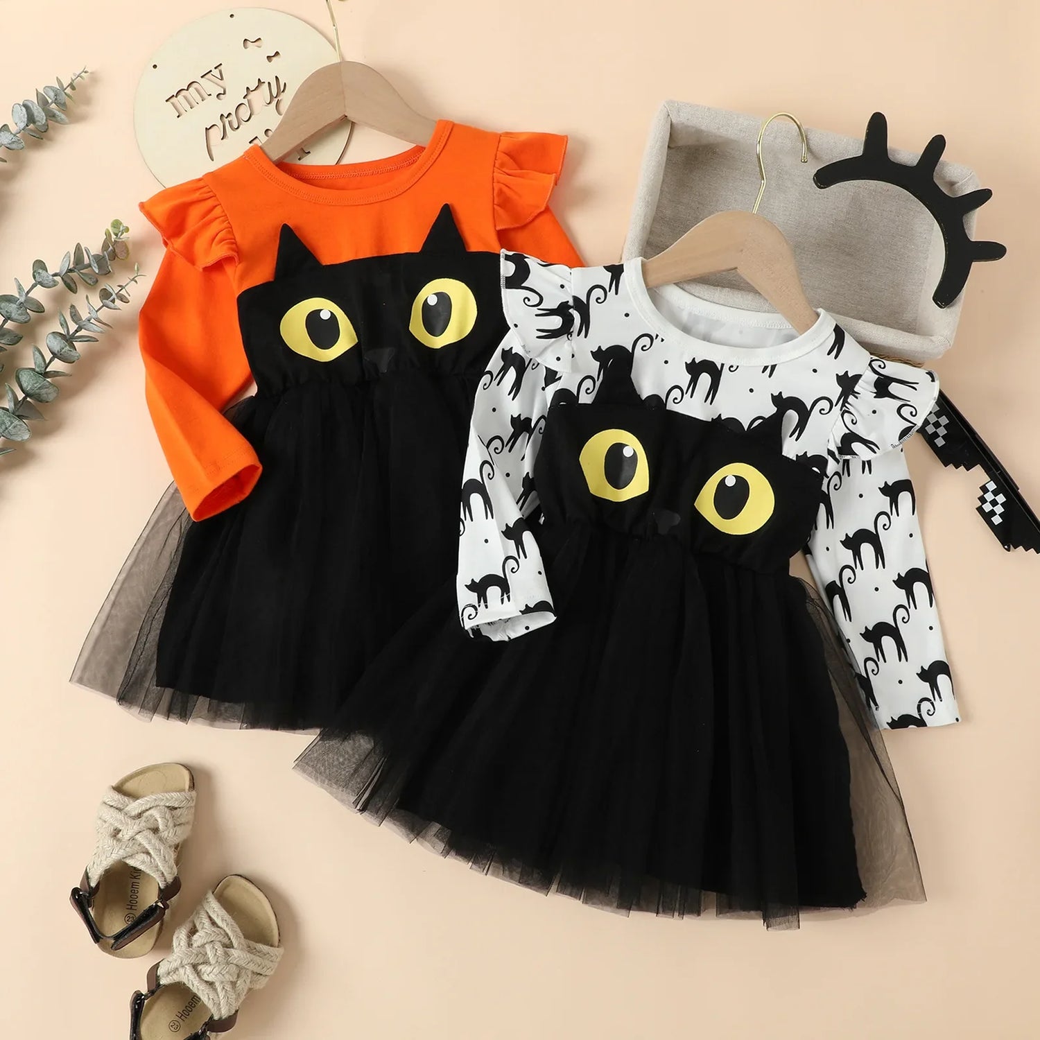 Halloween kids dress for girls with long sleeves, cartoon cat print, and black tulle skirt in European American style.