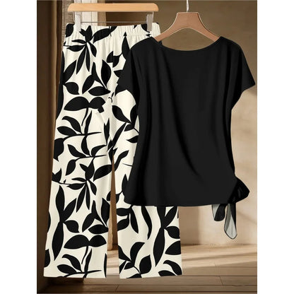 Women's plus Size Two-Piece Set Lazy Style Black Side Twisted T-Shirt And Black White Leaf Print Wide Leg Pants Casual Outfit Good Vibrations