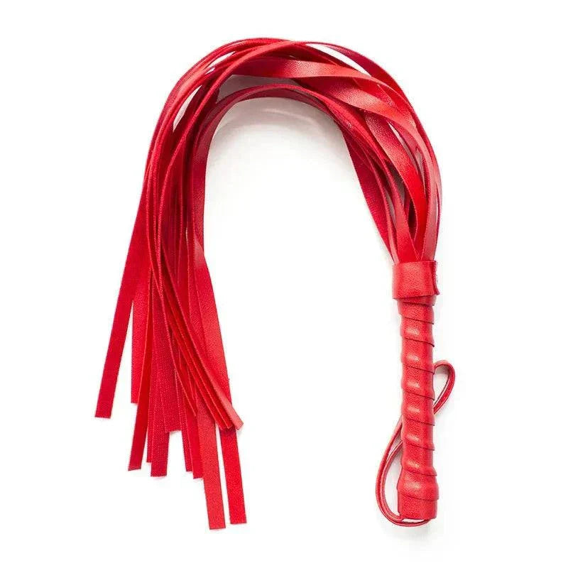 Red BDSM bondage flogger for adult erotic games with slave whip restraints.