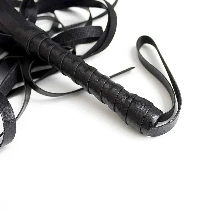 BDSM leather whip for adults' erotic games and bondage activities.