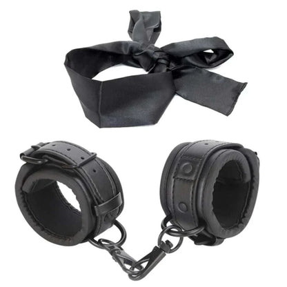 SM erotic leather handcuffs and footcuffs set for BDSM bondage play.