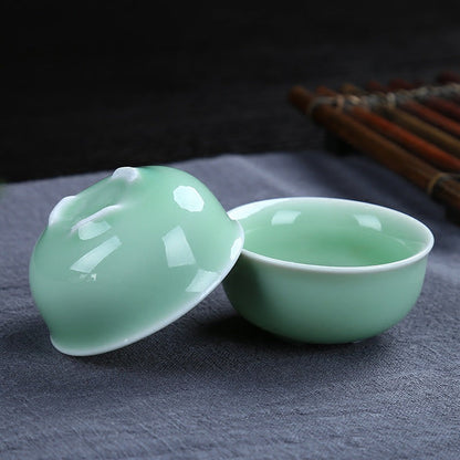 Dehua celadon kung fu tea set, carp pattern ceramic teapot set, a complete set of tea gifts, business event gift set, portable tea set gift box. Good Vibrations
