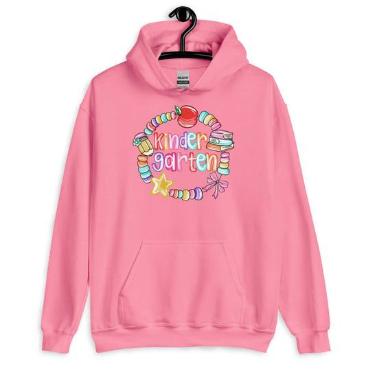 Pink unisex hoodie with colorful kindergarten-themed graphic and front pouch pocket