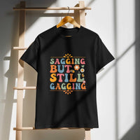 Saggin Still Gaggin DryBlend® T-Shirt on hanger, moisture-management fabric, modern fit.