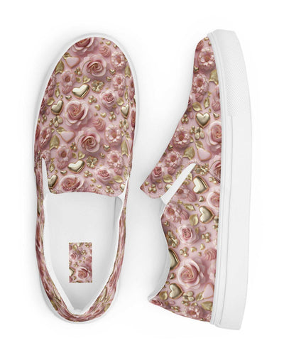 Women’s slip-on canvas shoes with pink floral and gold heart pattern, elastic side accents, and white rubber outsole.