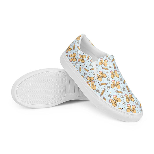 Women’s slip-on canvas shoes with butterfly and pencil pattern, removable soft insoles, and rubber outsoles for comfort and style